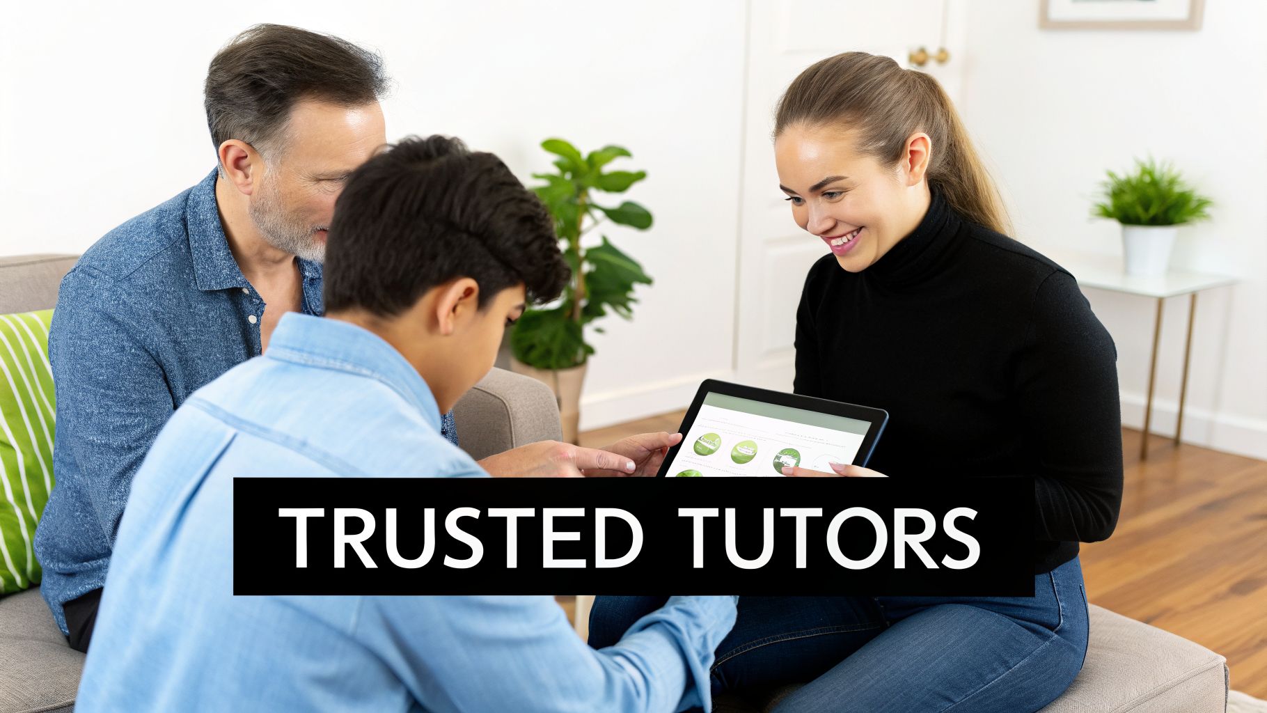 A female tutor smiles while showing educational content on a tablet to a young student, with an adult supervising.