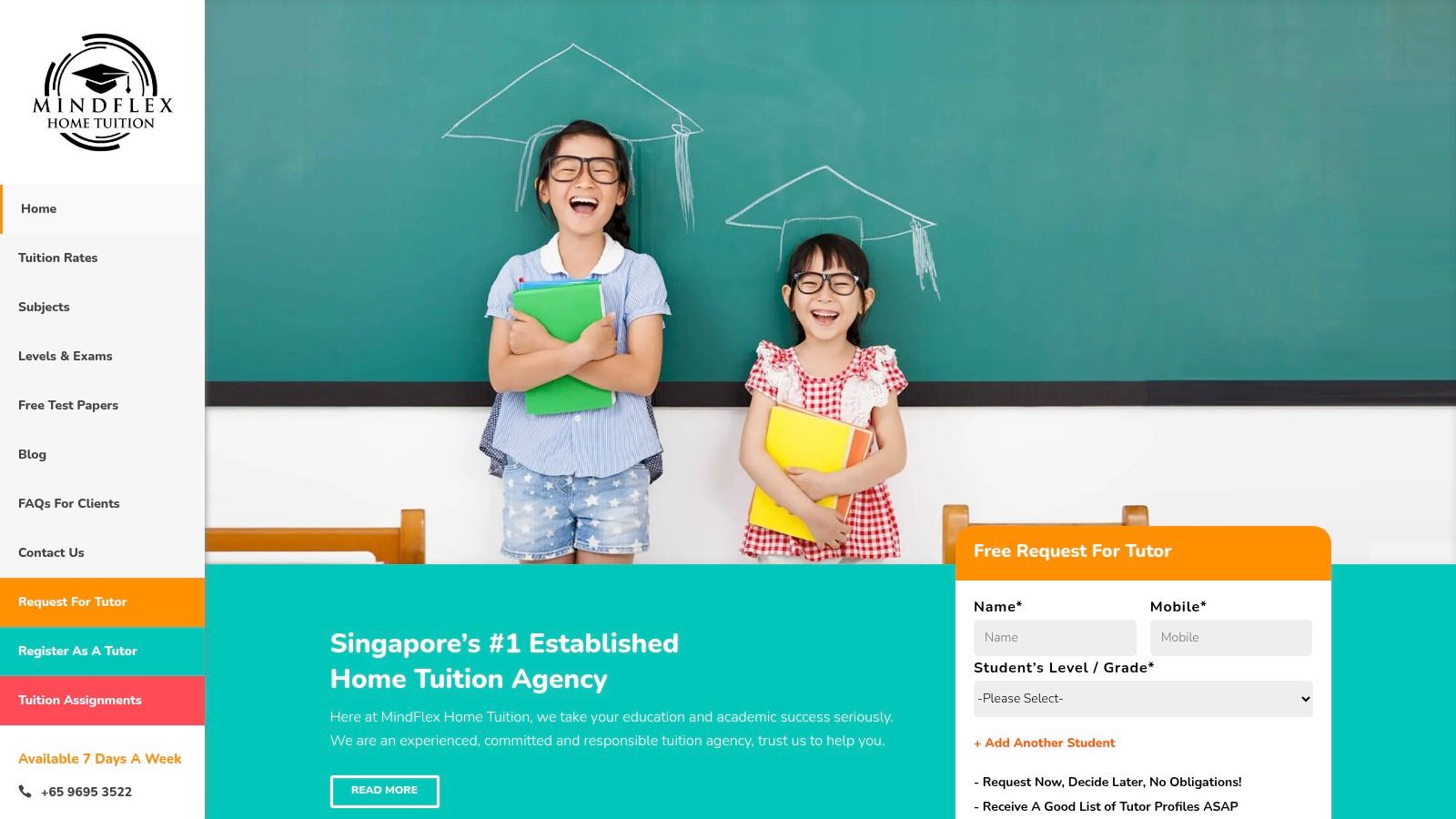 A smiling tutor helping a young student with her studies.